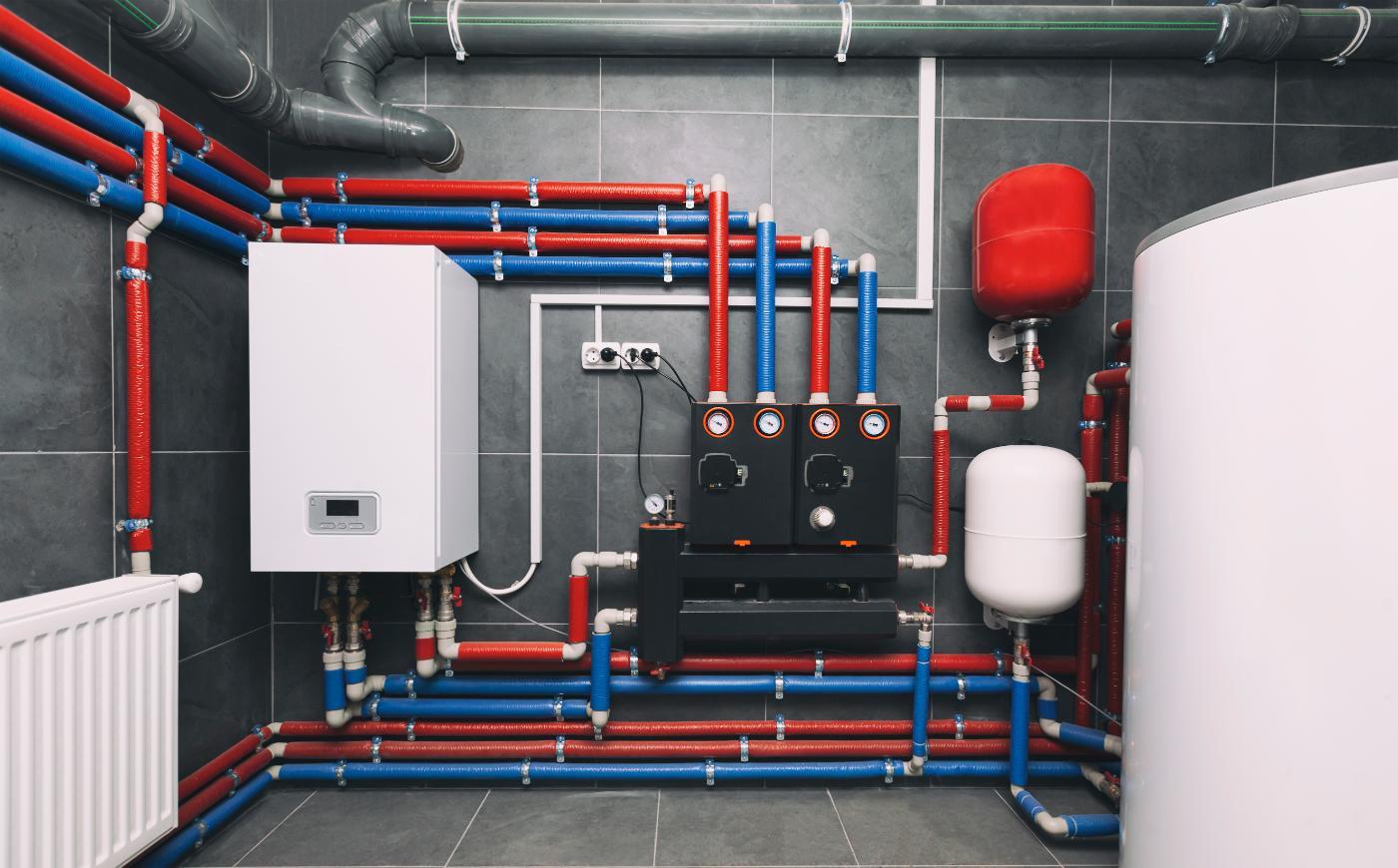 Whole-home water system with softener tank, manifolds and insulated supply lines